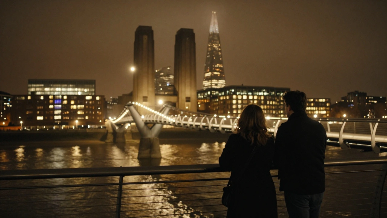 The Millennium Bridge glows at night, lit like a golden ribbon over the Thames with Tate Modern in the distance.